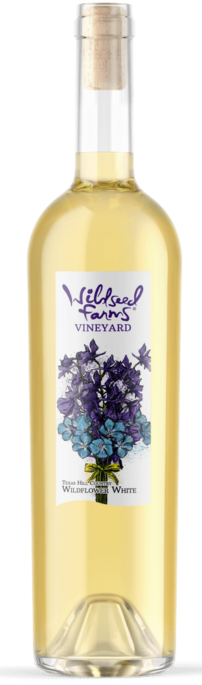 Wildseed Farms & Winery Like a breeze through a summer meadow, Wildflower White opens with a soft mix of orange peel, green apple, and lemongrass. Off-dry on the palate, the wine is clean and minerally with a refreshing lift that makes it endlessly drinkable. The grapes come from sandy soils with excellent drainage, where warm days and moderate water stress produce expressive, aromatic fruit. It’s delicate yet confident—a blend that speaks of place and balance. Bottle Preview