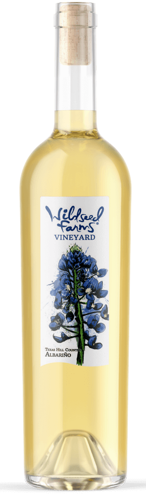 Wildseed Farms & Winery This Albariño is crisp, coastal, and full of life. Pale straw in the glass, it opens with aromas of nectarine, lemon zest, and a touch of honeydew. The palate is taut and fresh, bringing citrus and stone fruit together with a mineral edge and lingering salinity. The vineyard’s morning sun and deep sandy loam soils create the ideal conditions for Albariño to retain its hallmark acidity and maritime freshness. It's a perfect pairing for seafood—or for sipping all on its own.This pale-straw Albariño presents ripe nectarine, zesty lemon peel, and sweet honeydew on the nose. Crisp citrus and stone fruit flavors are enlivened by well-preserved acidity from morning sun and deep sandy loam, finished with a touch of saline minerality. Bottle Preview
